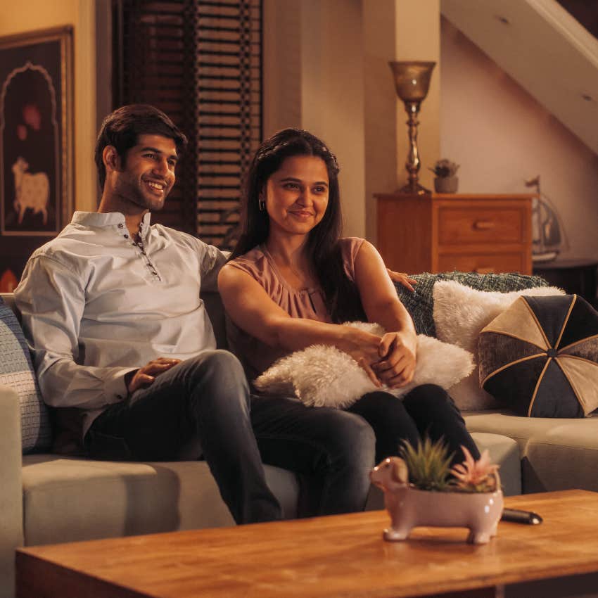confident couple with nothing to prove sharing a nightcap