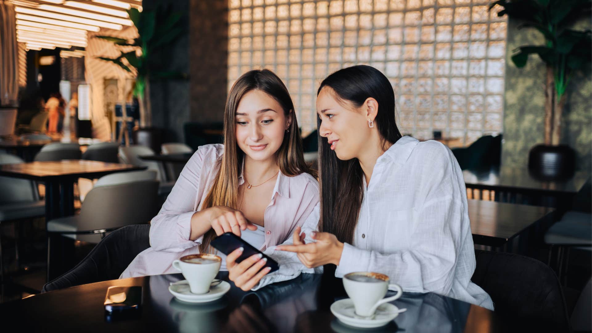 two women are indecisive over what they want to order