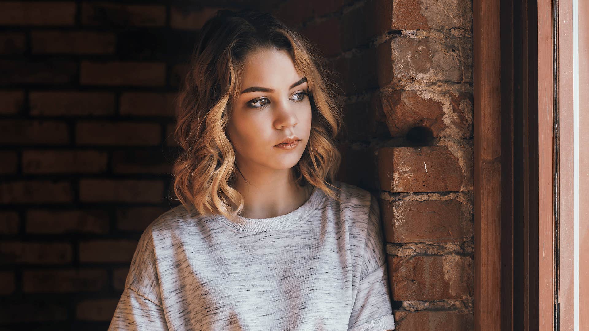 woman sees the sad signs he's simply not the one for her because he doesn't recognize her worth