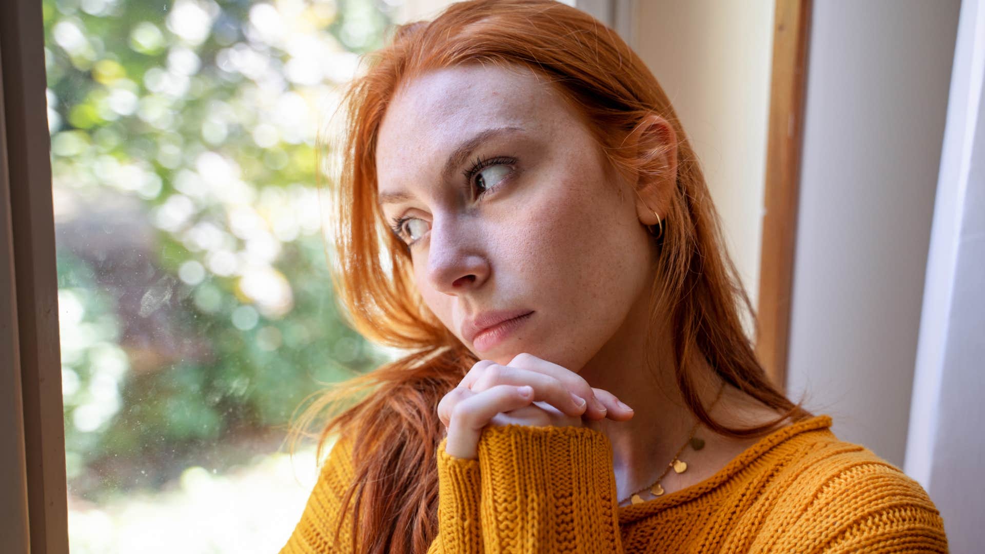 sad woman preferring solitude instead of socializing