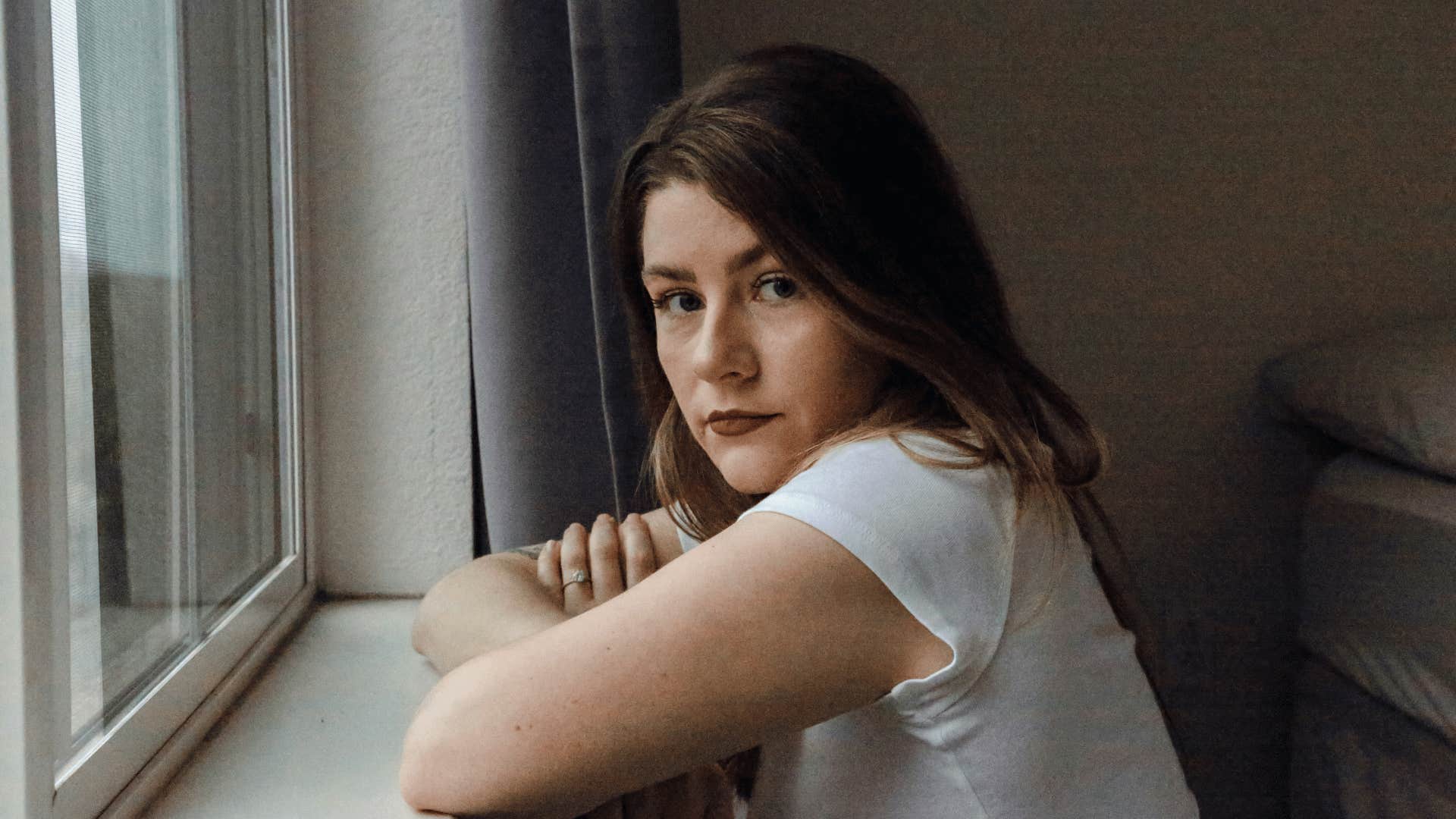 serious young woman learning forgiveness is not a favor to the person who hurt her