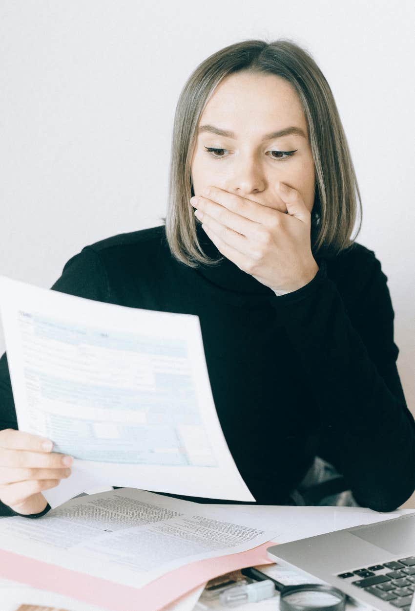 shocked woman reading phrases sketchy companies use in their job descriptions