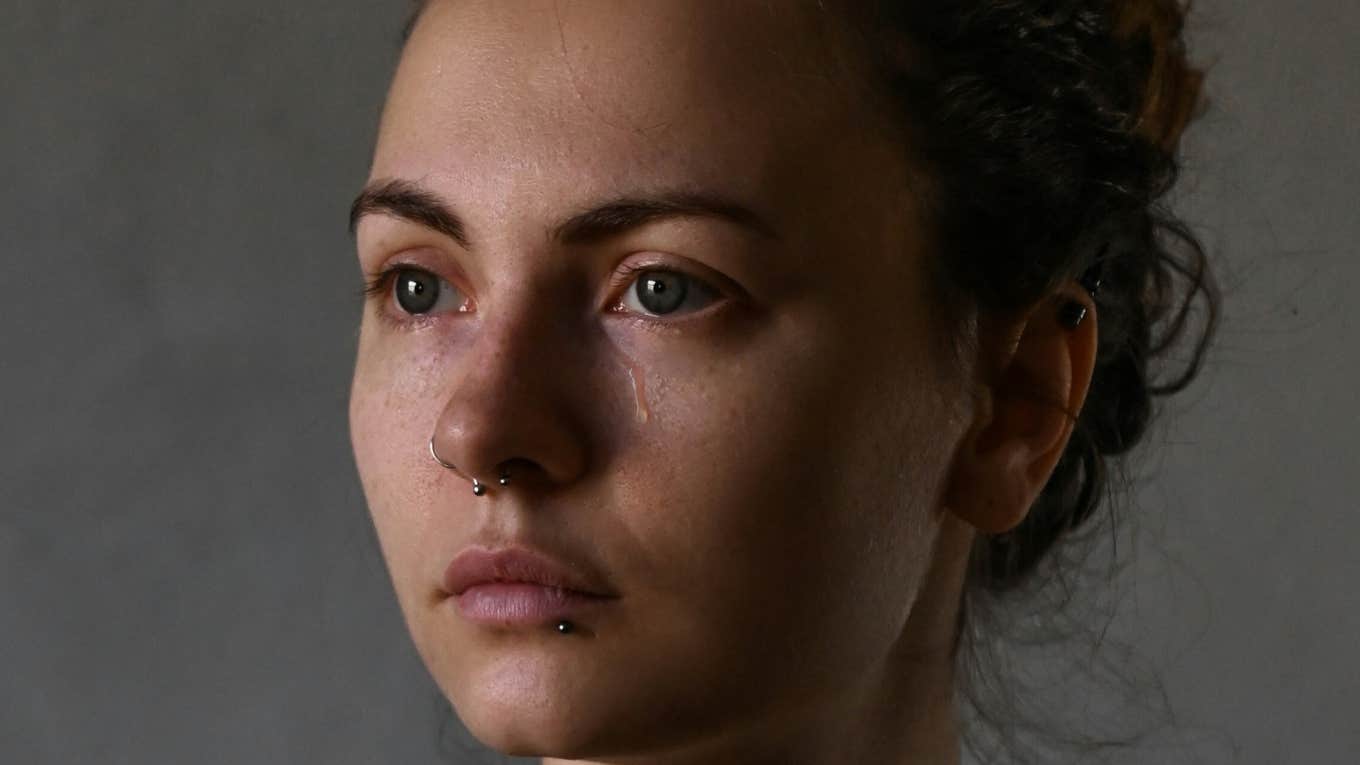 It Starts Small — But This Little Sign Often Means Your Marriage Really Falling Apart, Says Psychotherapist Woman's marriage falls apart.
