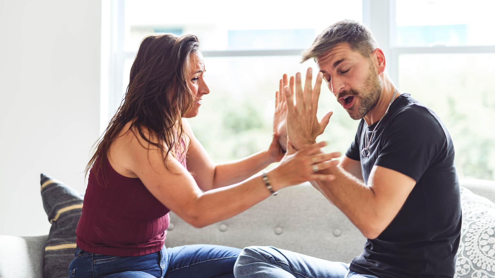 woman dealing with man using unkind words who needs control to feel secure