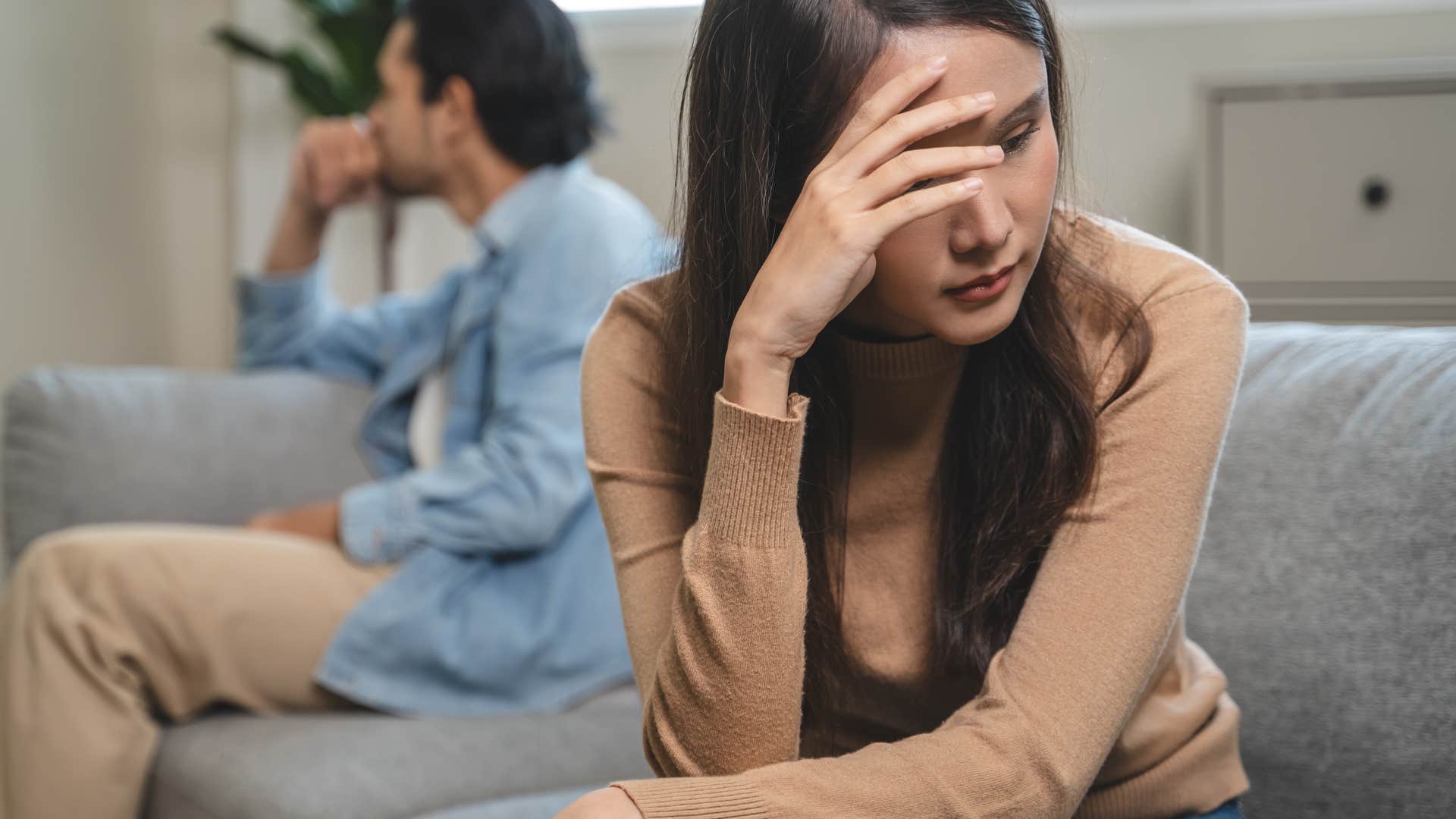 man who is going through the motions as he is making plans without any thoughts to hers