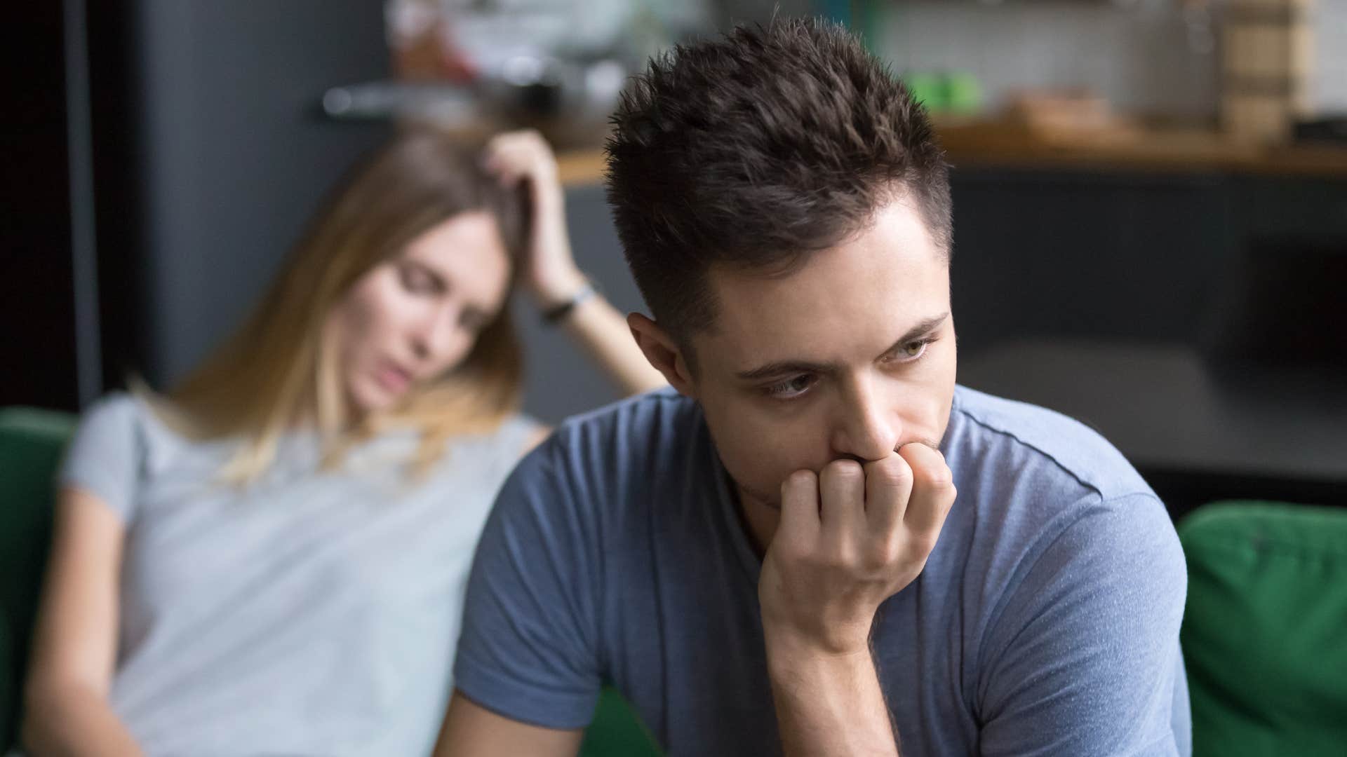 immature man avoiding difficult conversation with partner