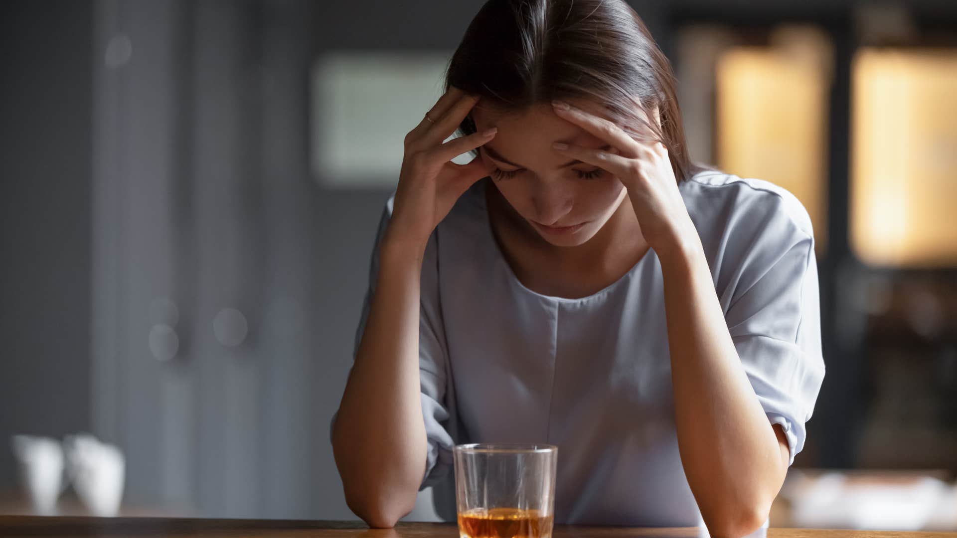 woman who is considering divorce and drinking more