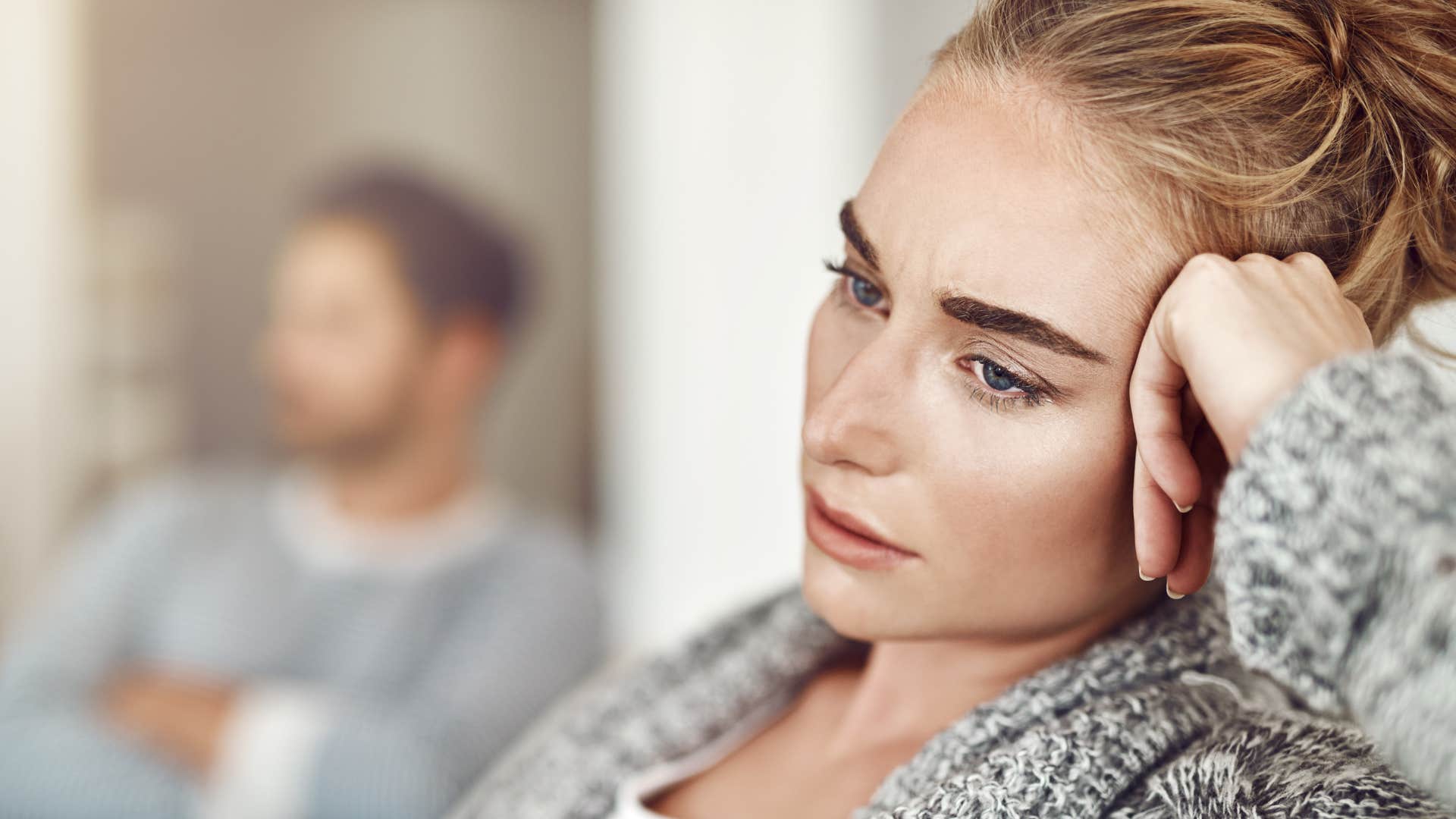 woman feeling emotionally drained after speaking to partner