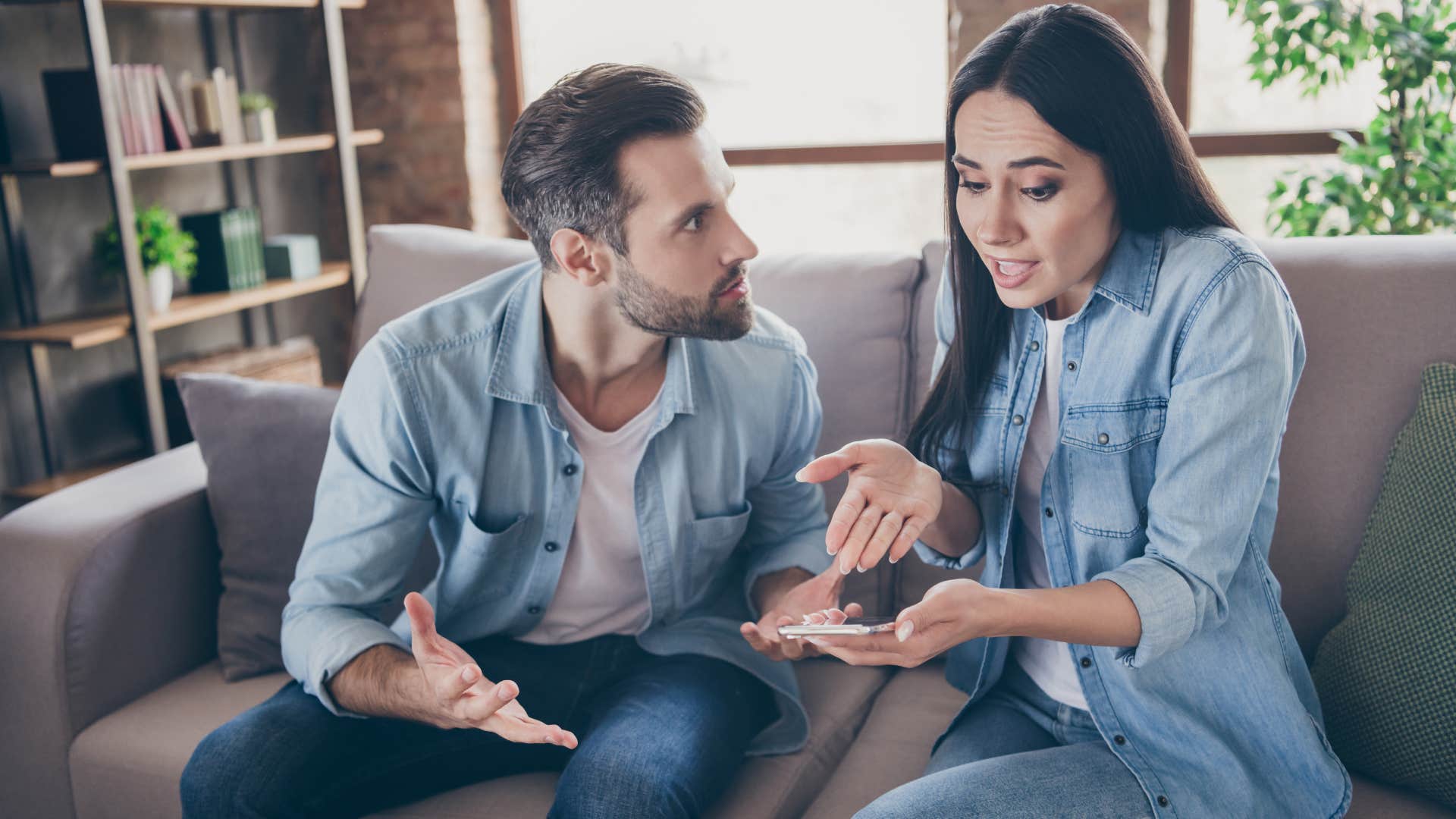 woman confronting her boyfriend after he disrespected her boundaries