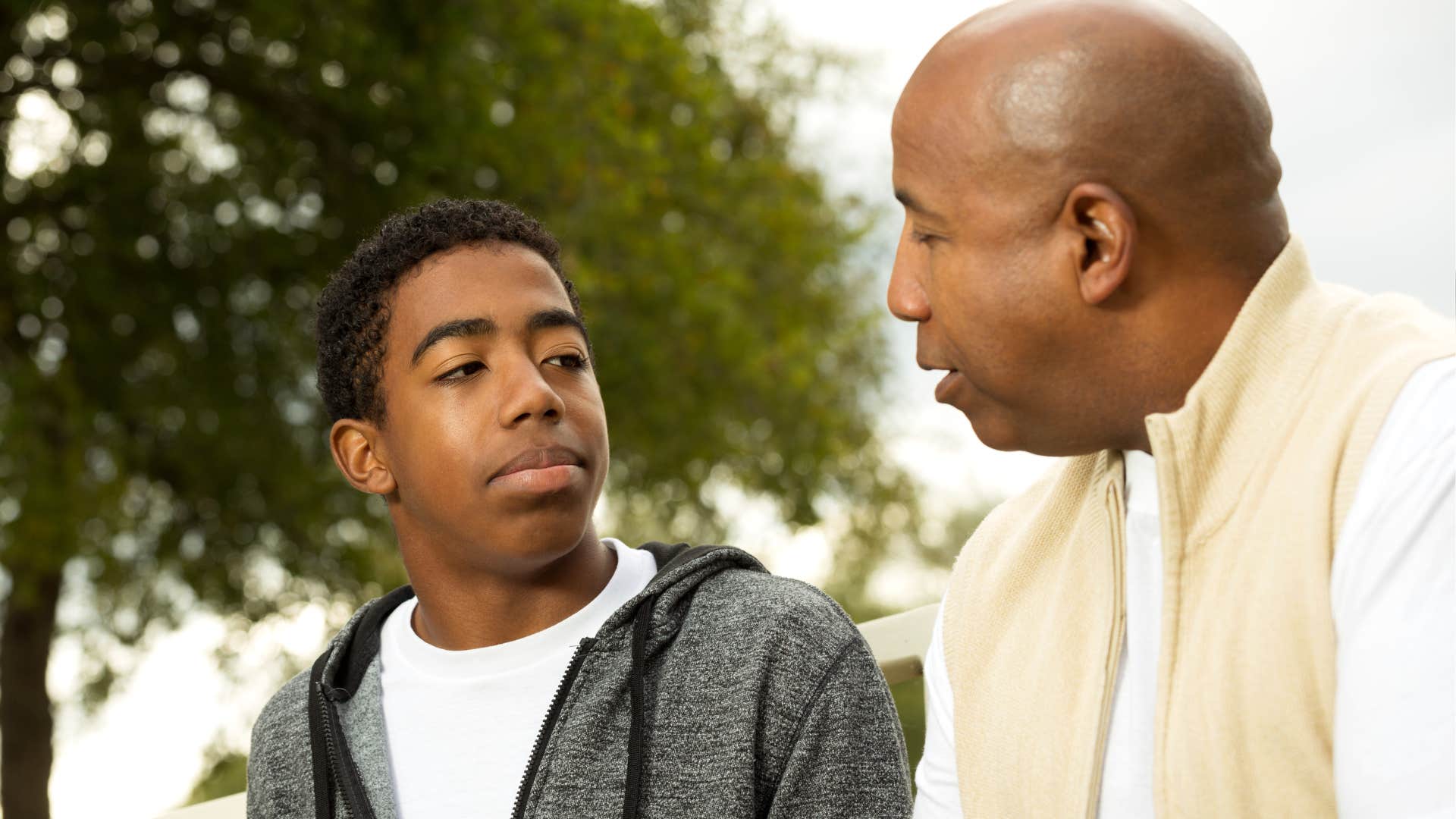 man who prefers deep connections and conversations talking to his son