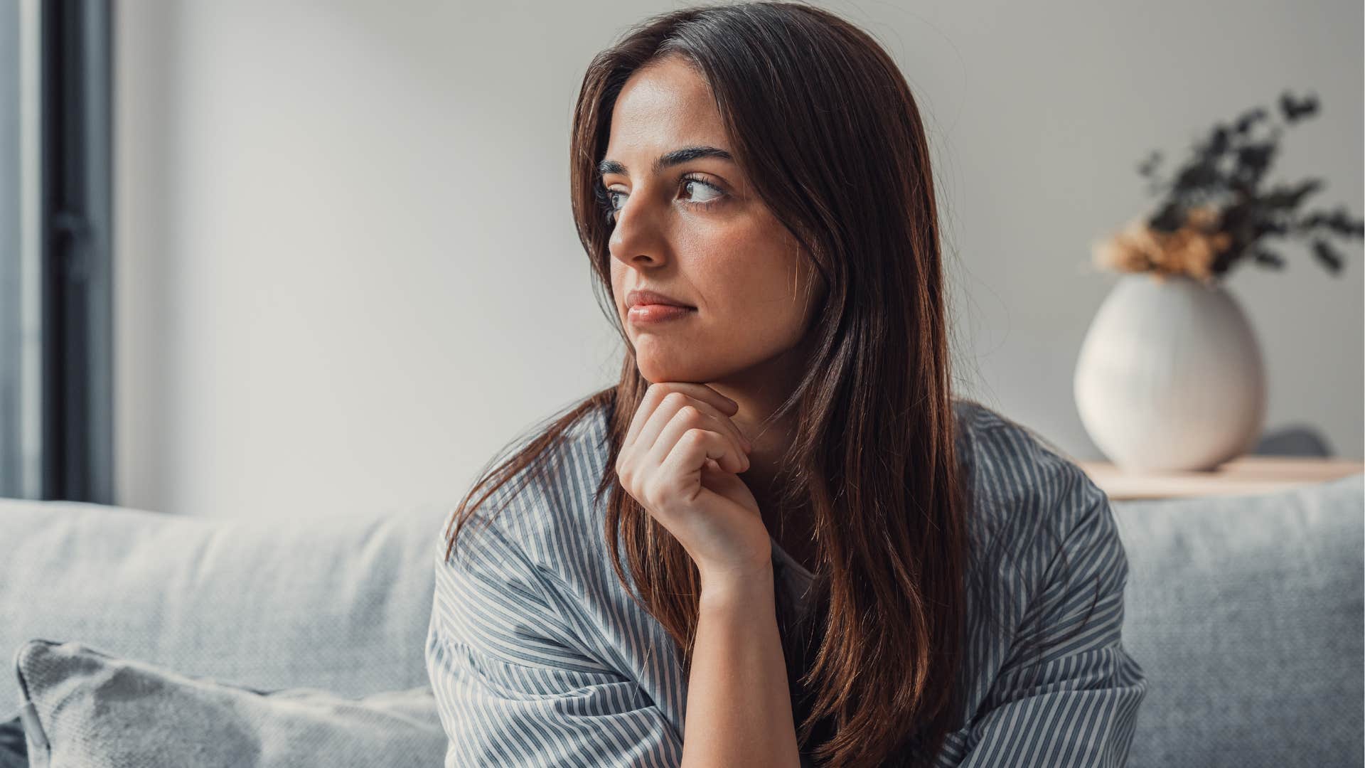 sensitive woman enjoying solitude at home