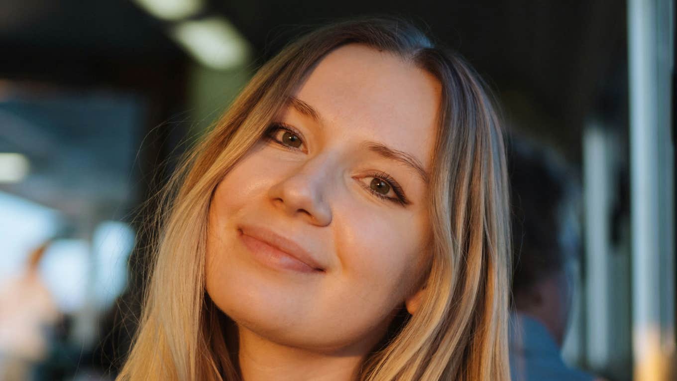 Simple Skills To Feel A Bit Happier Each Day, According To Psychology Woman feels happier each day.