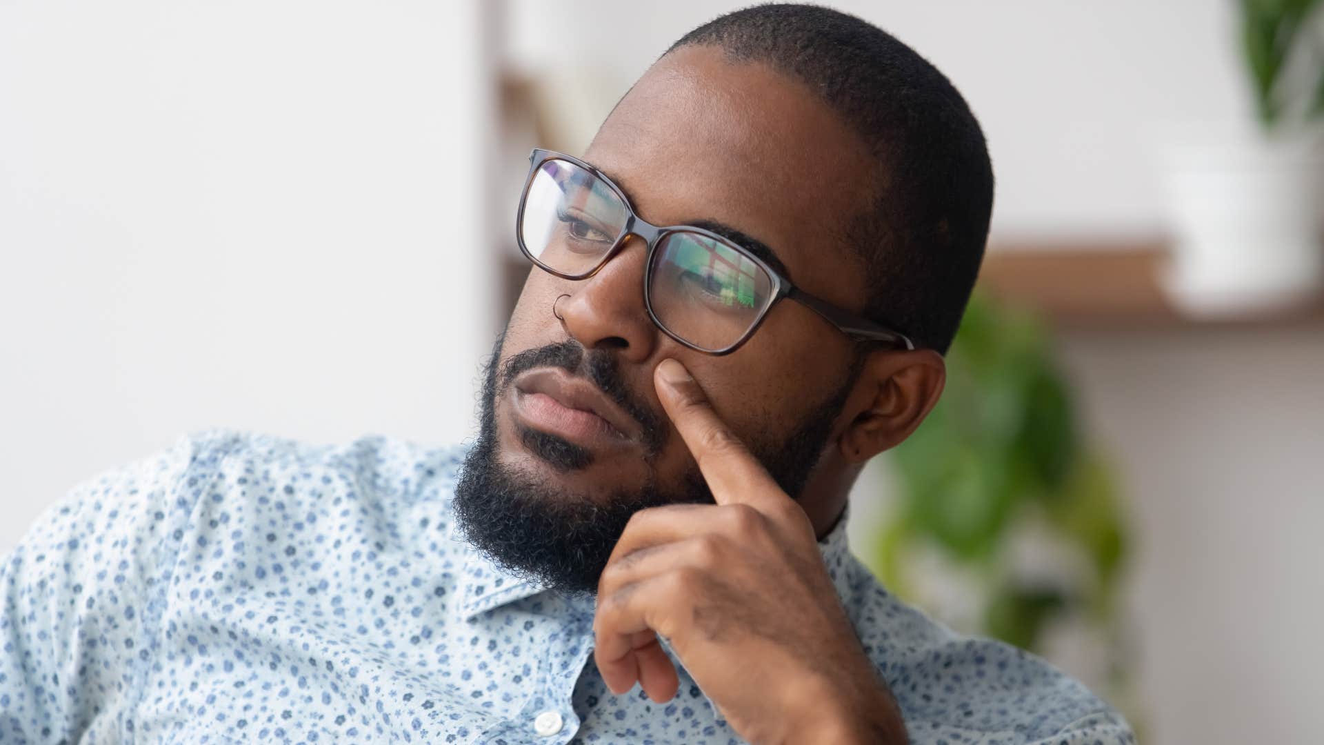 successful pensive man reflecting deeply on failure