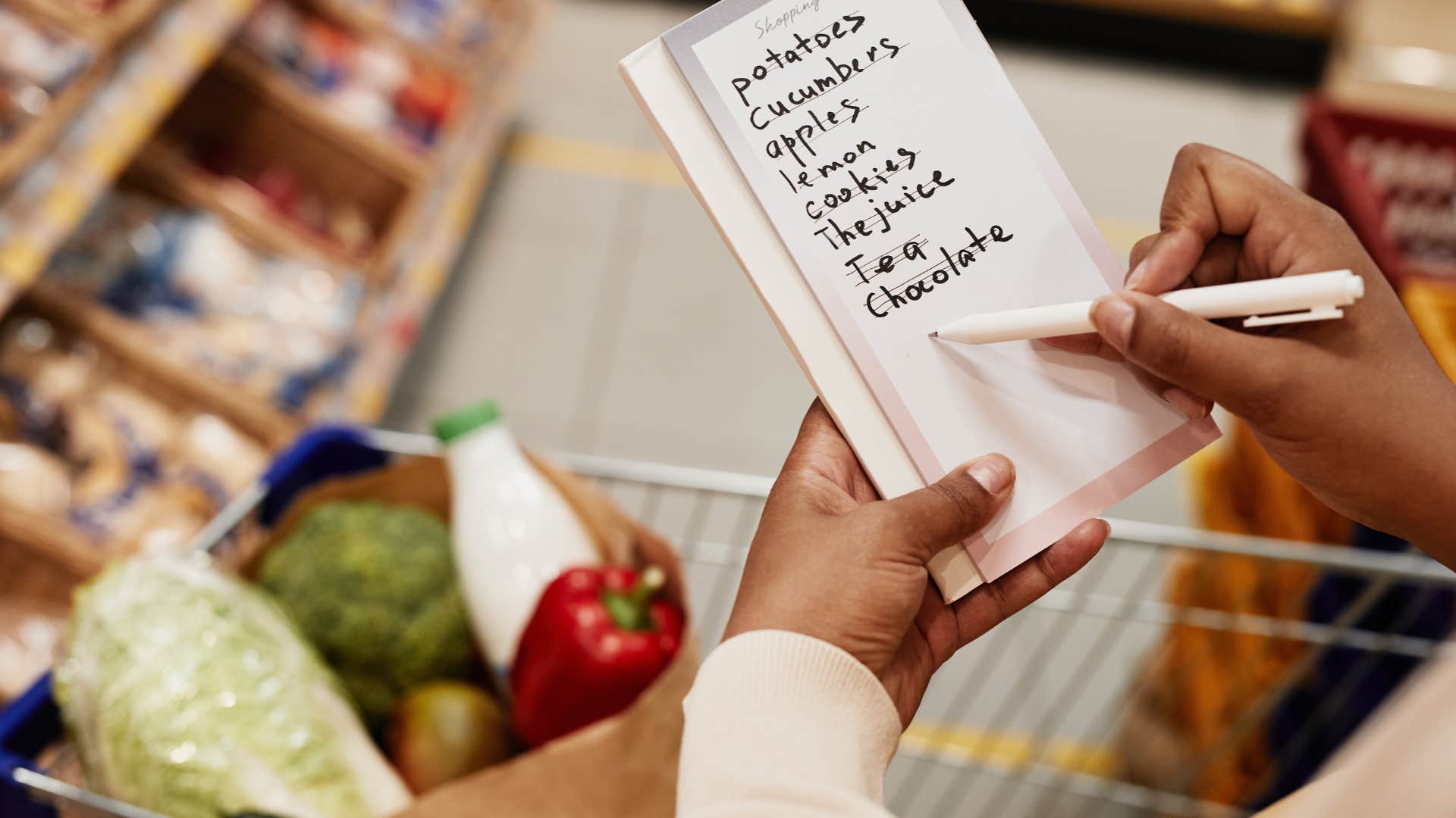 small things frugal people keep in their kitchens that save them a ton over time a grocery list pad or app