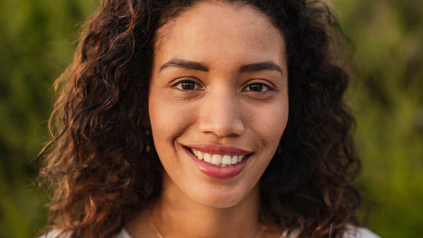 Social Rules Highly Intelligent People Refuse To Follow highly intelligent woman smiling refusing to follow social rules