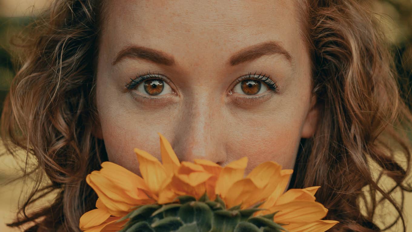 Woman stares into eyes.