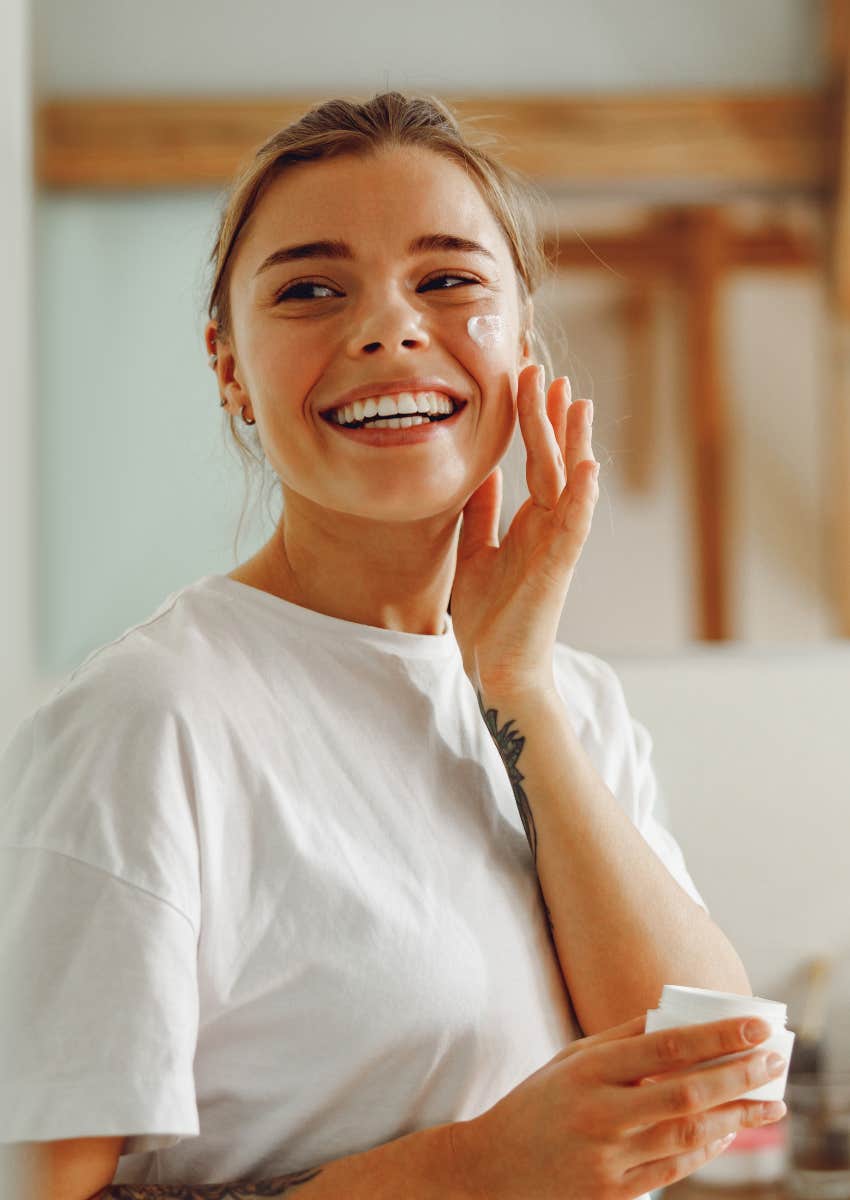 woman who organizes bathroom items taking care of herself
