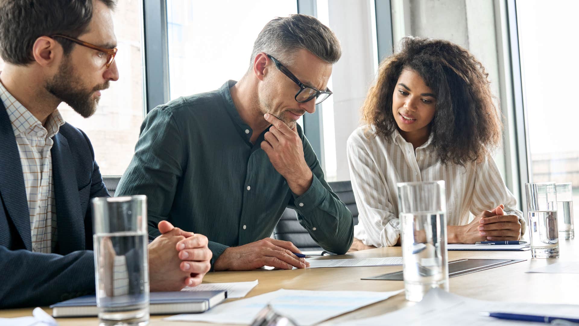 employees in a meeting discussing project