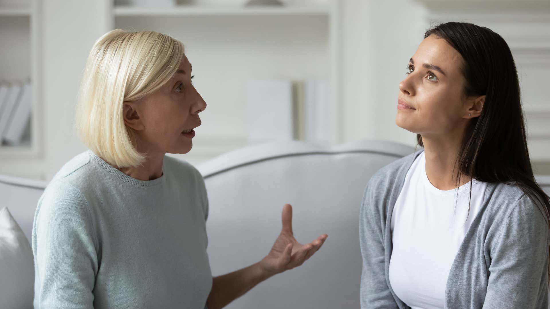 boomer woman talking down to young woman
