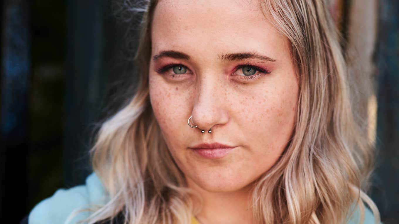 young gen z woman looking annoyed