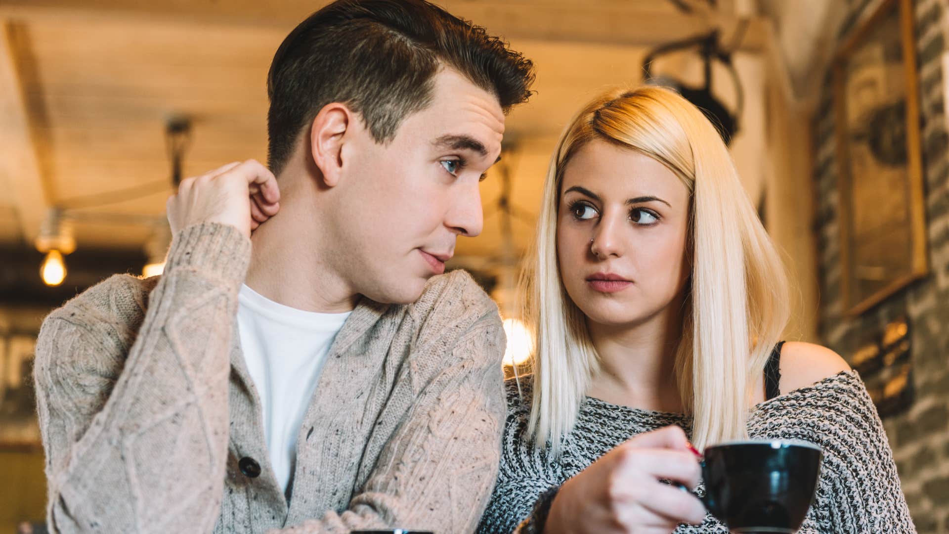 Man who always fills awkward silences talking to a woman.