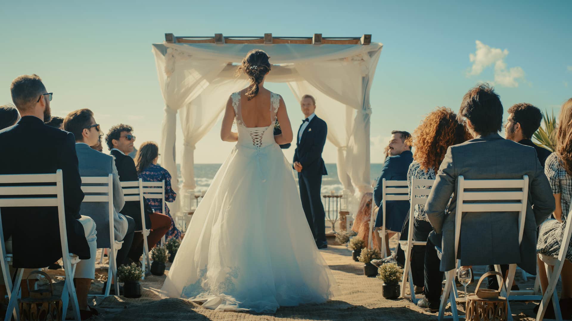 a couple get married in another country forcing their guests along with them
