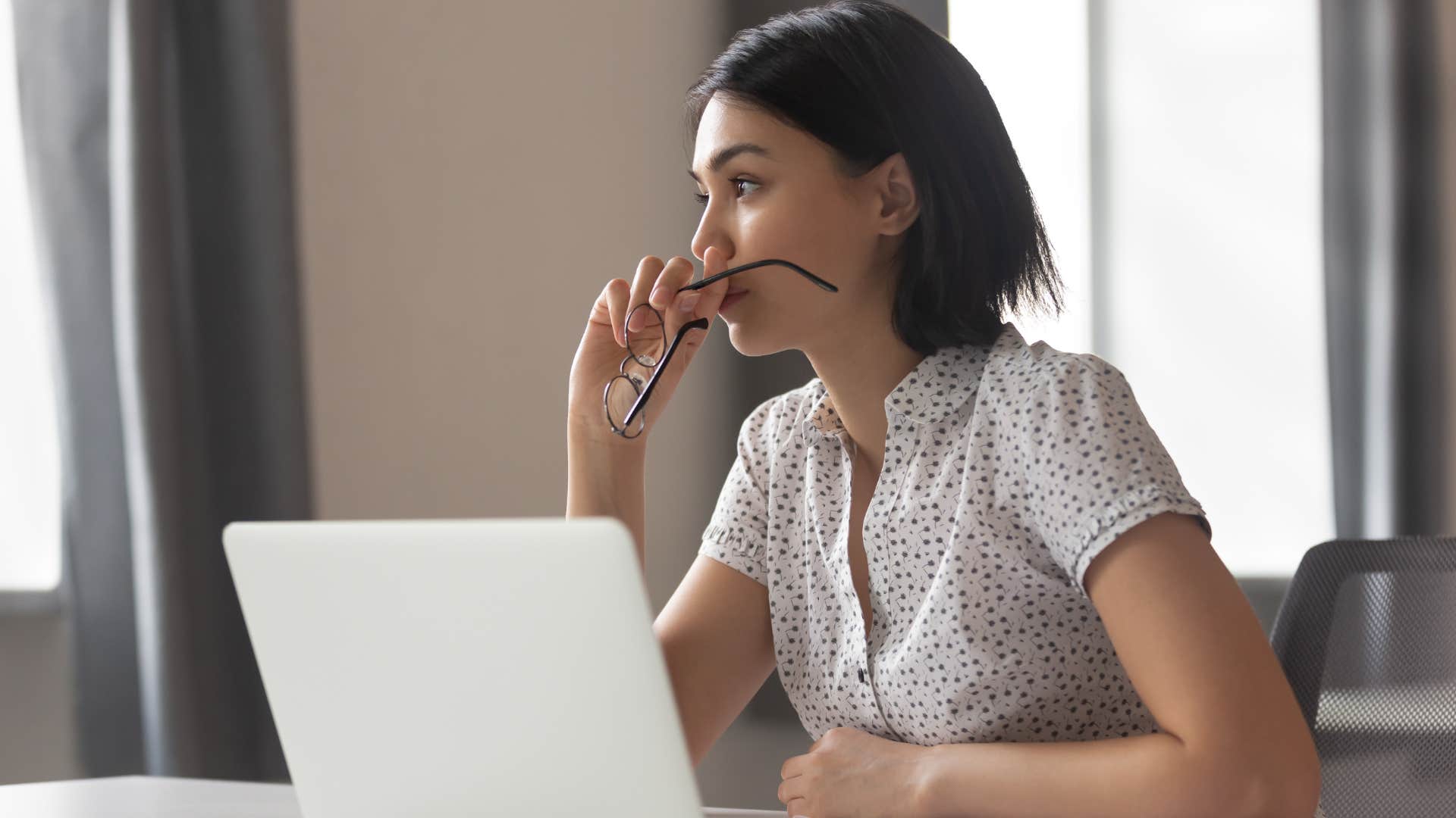 exhausted woman where the idea of a new job improves her mood