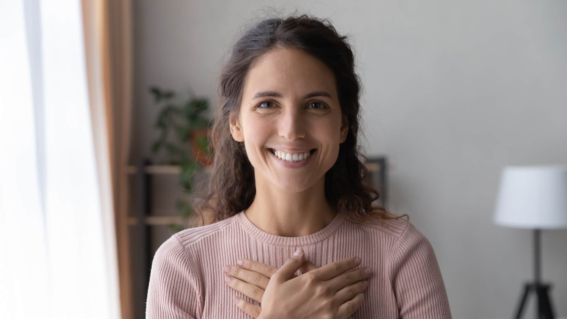 Happy woman feels lucky