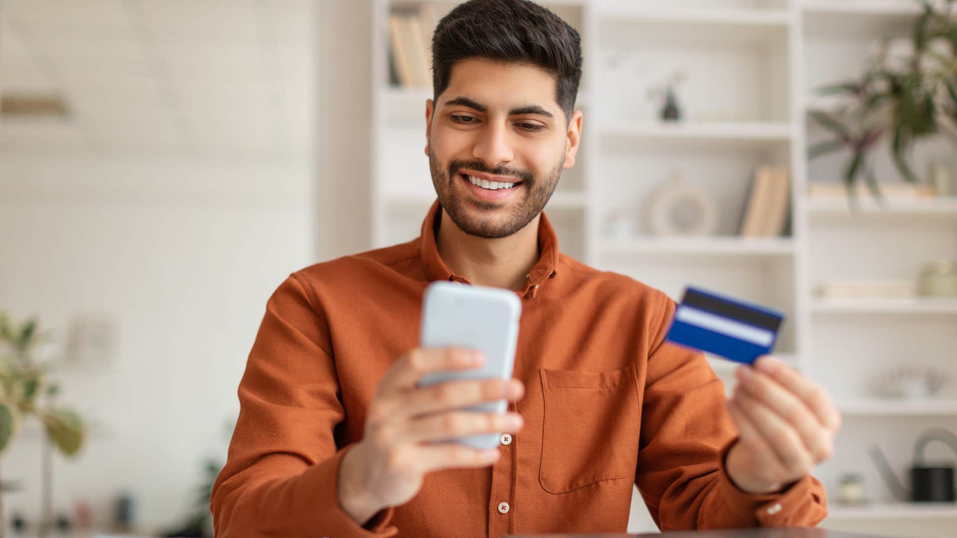 Man overspending on convenience while online shopping.
