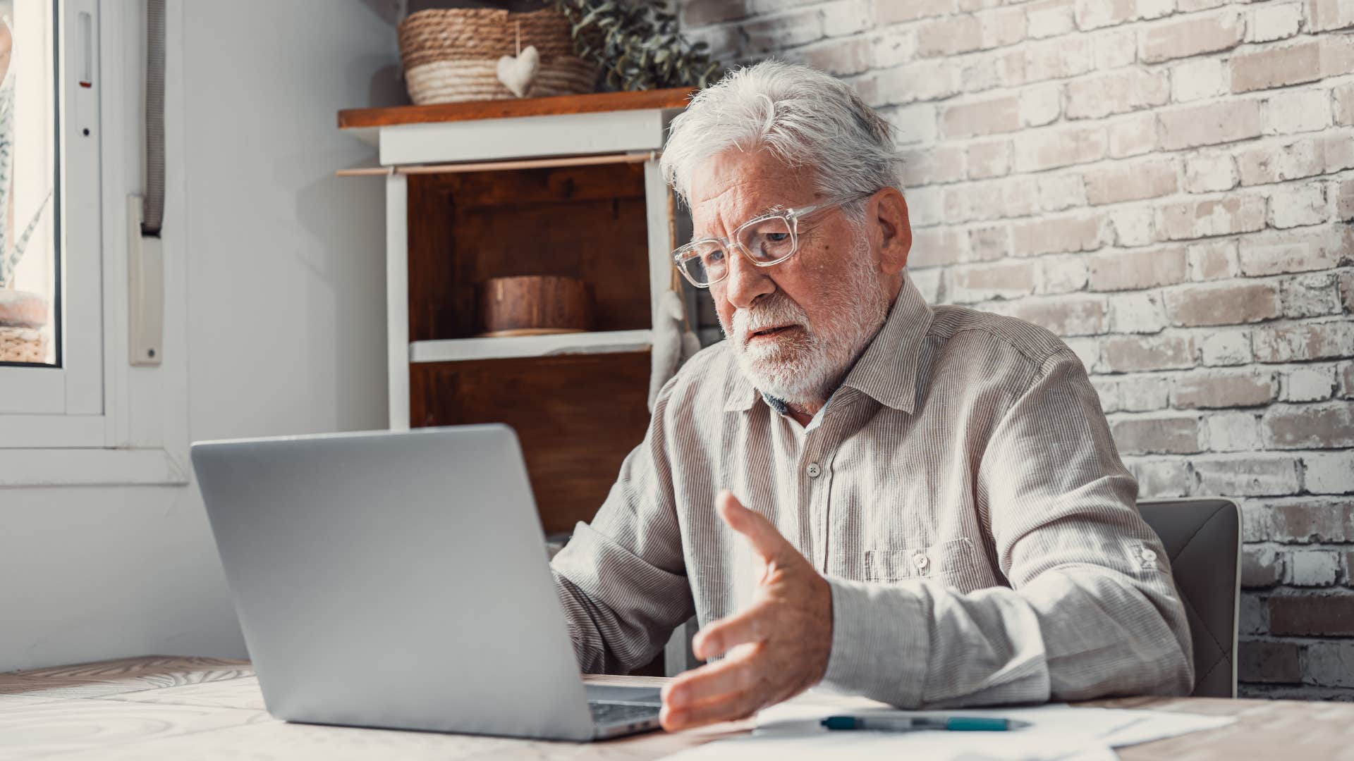 older man refusing to pay high premiums on his insurance policy