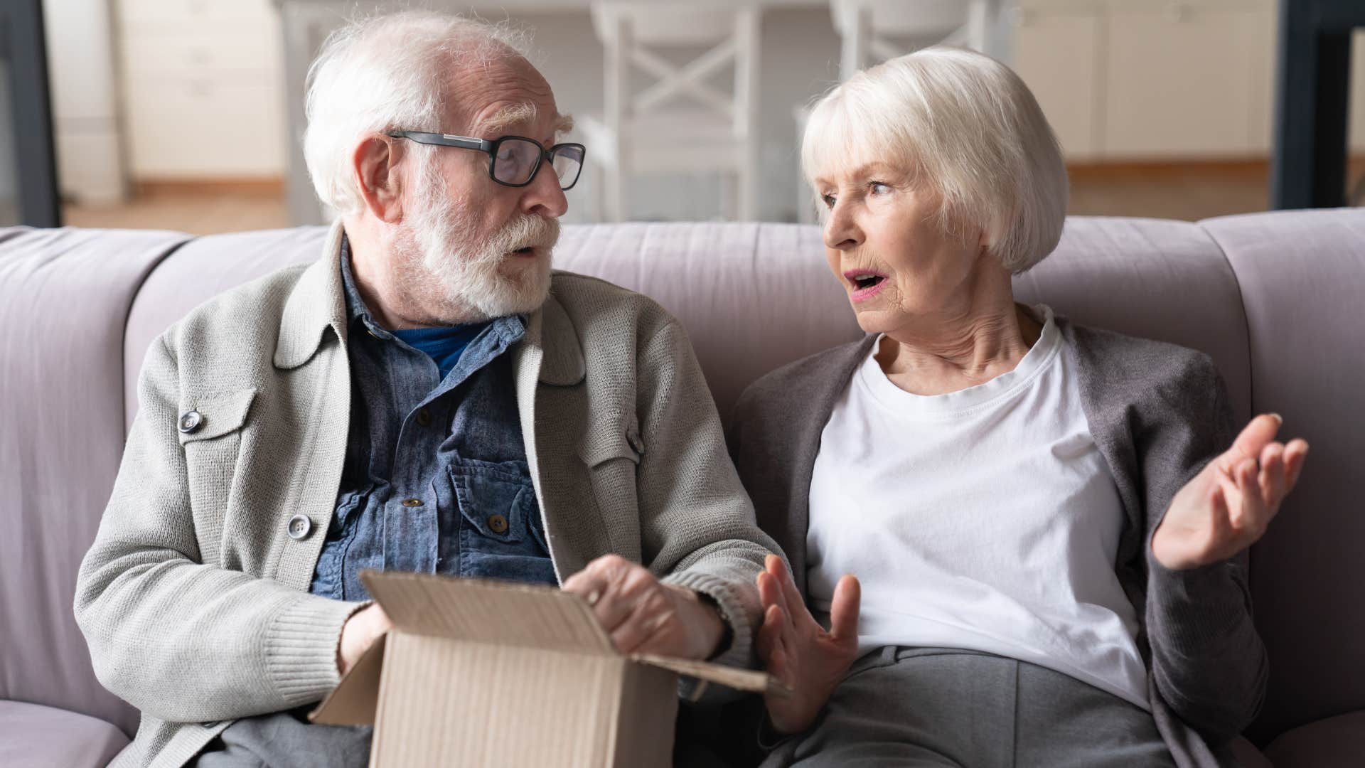 older couple arguing over shipping and handling on a package