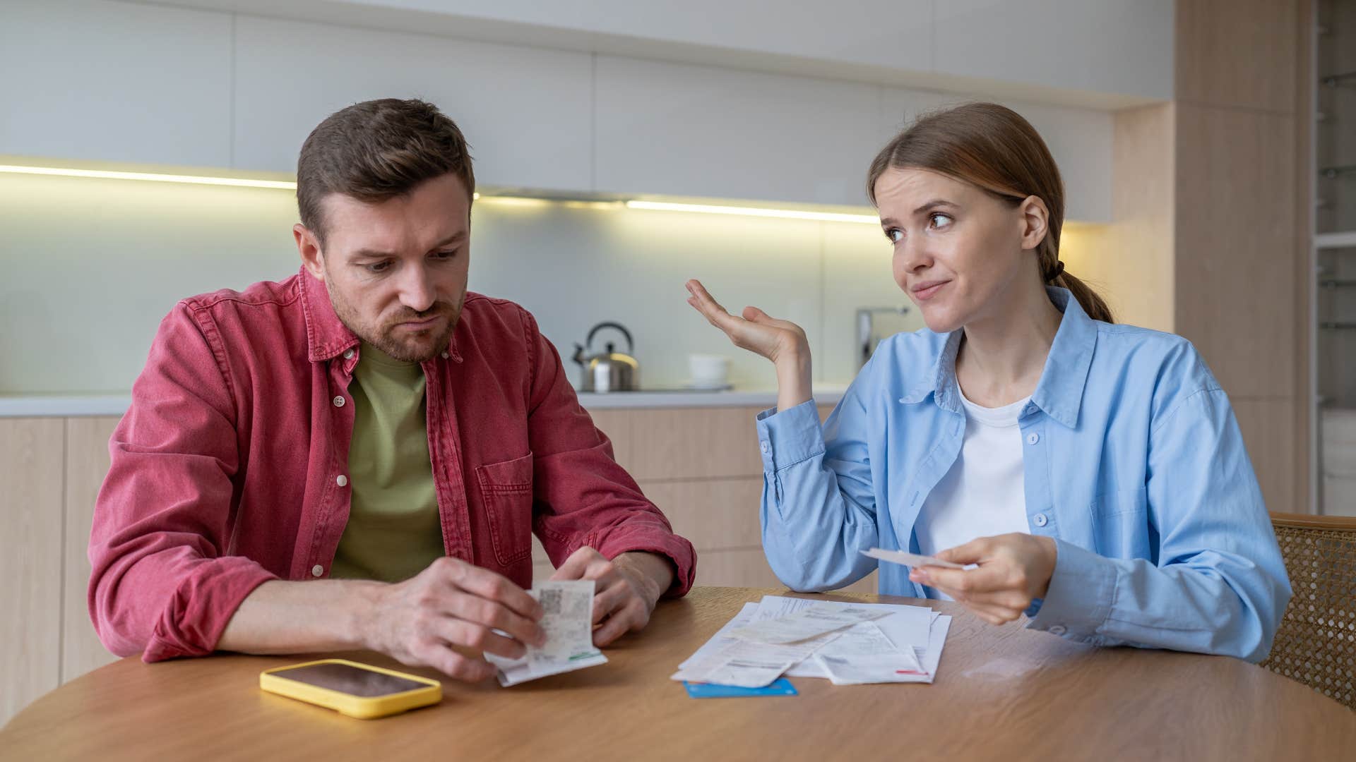 couple discussing their monthly car payments