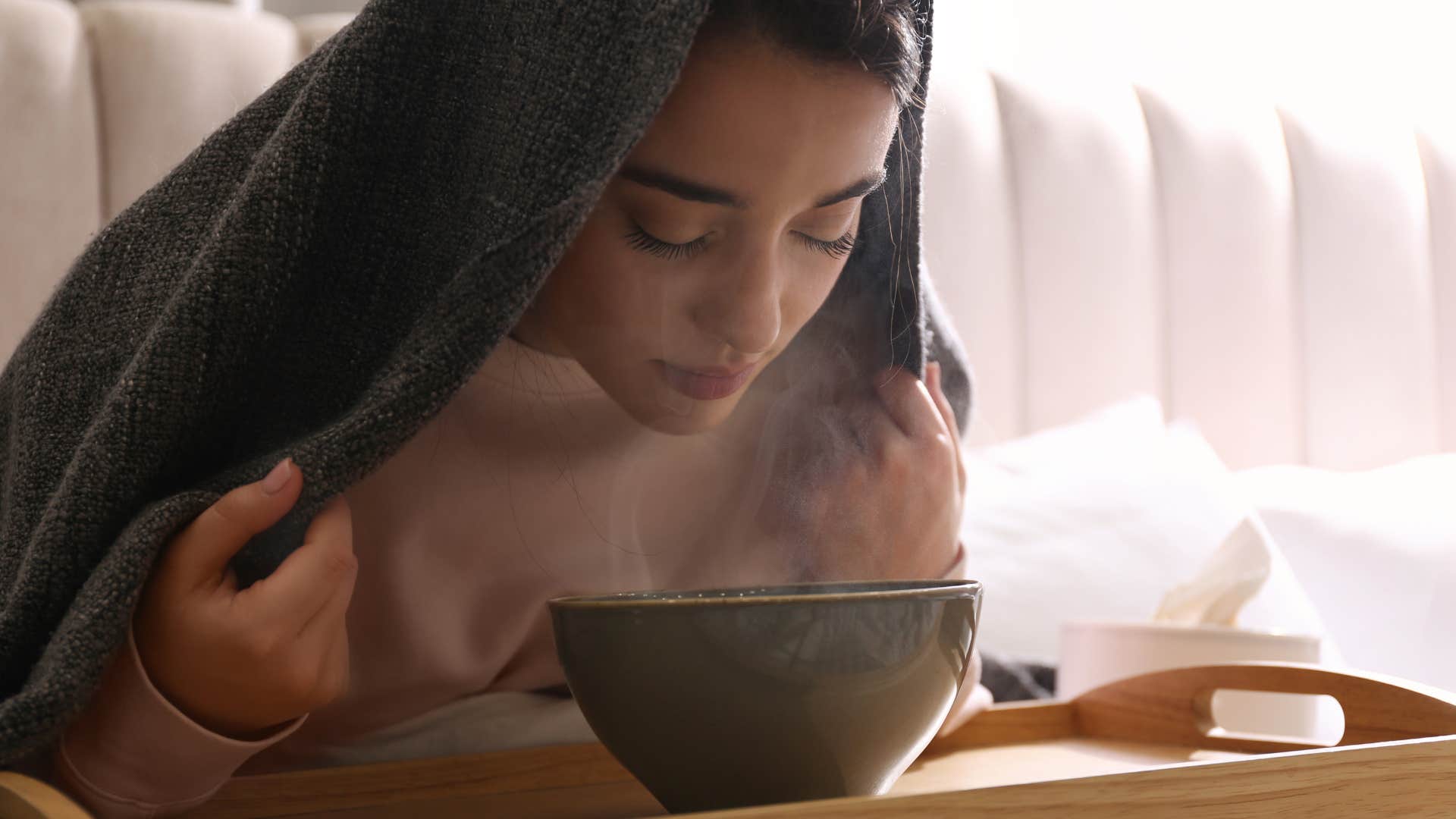 woman steaming her face