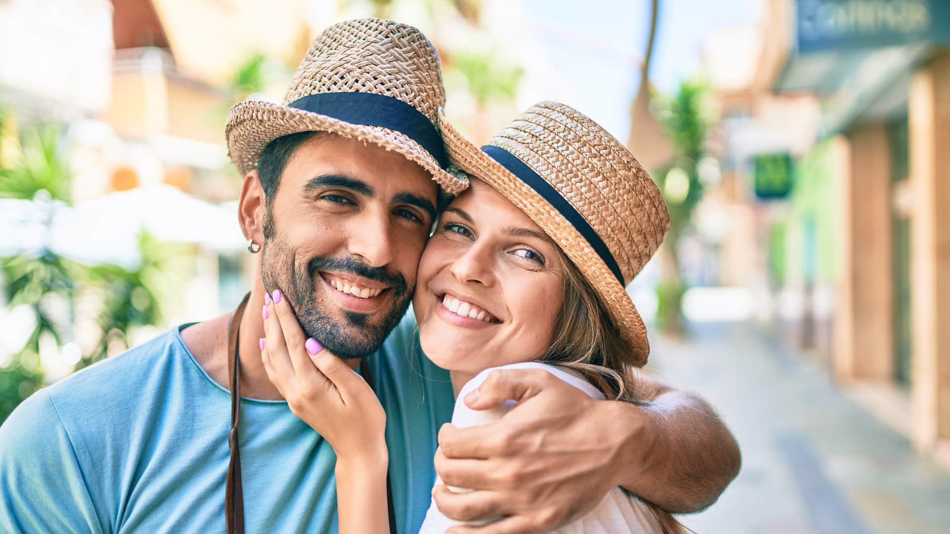 couple doing pda in public hugging