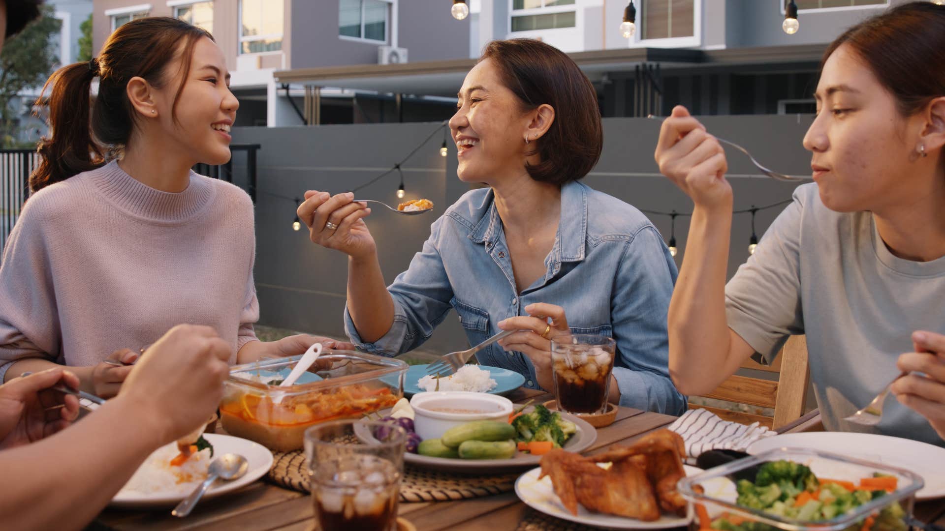 people enjoying food as they brought something to the party 