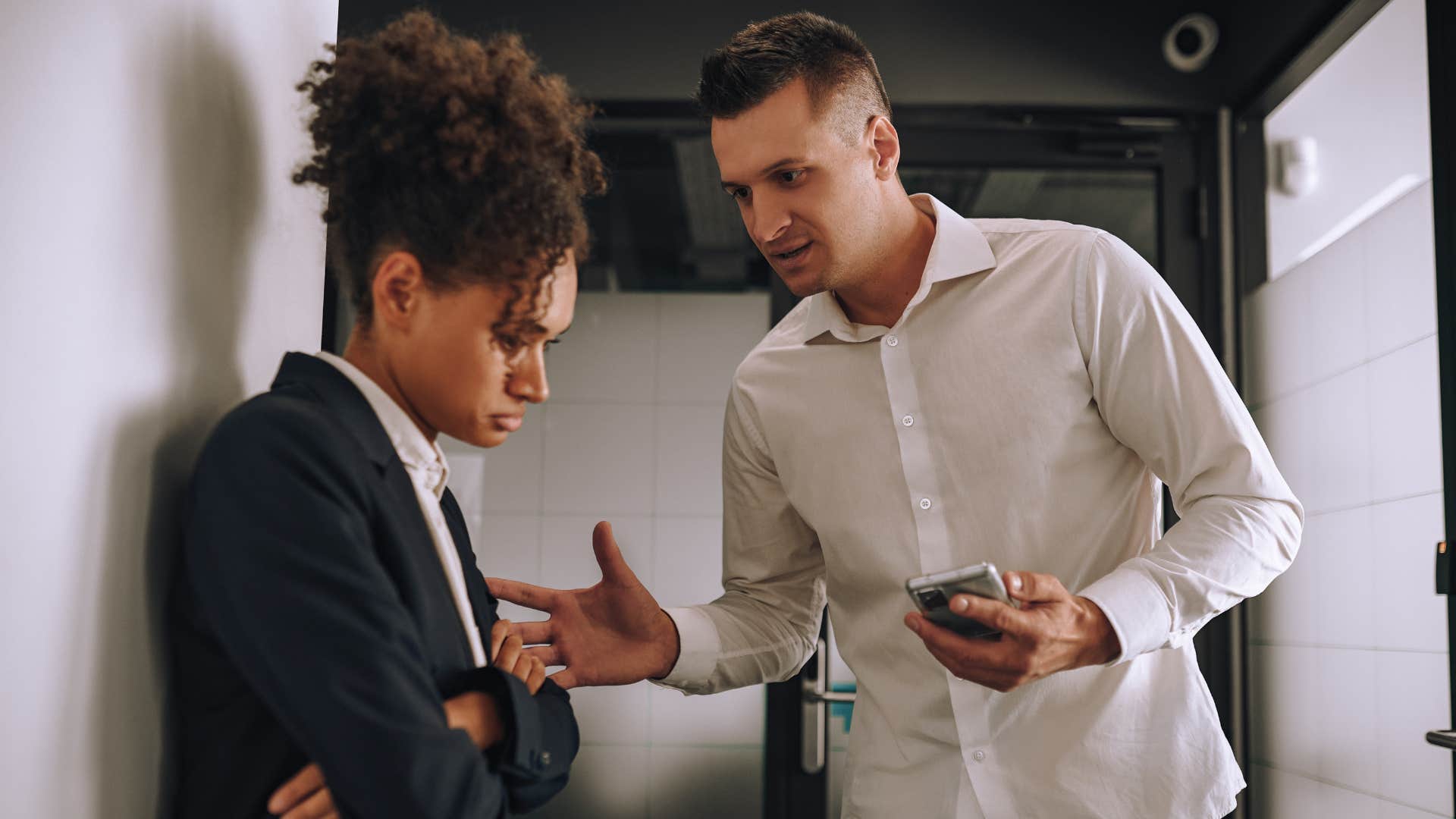 manager telling female employee she's too distant with co-workers