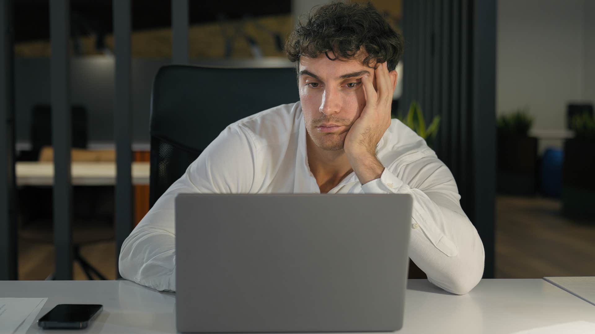 man who lacks curiosity not working on laptop