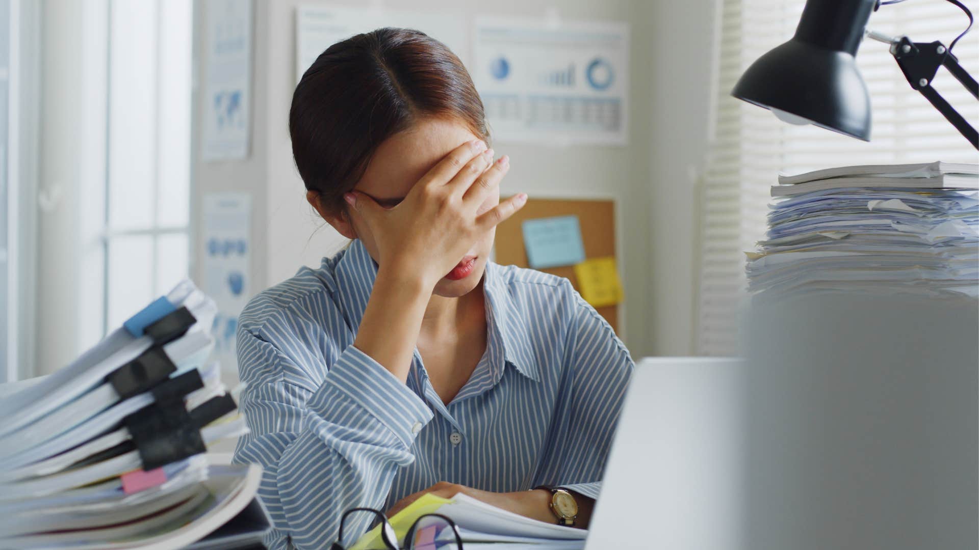 overwhelmed woman lacking initiative at work