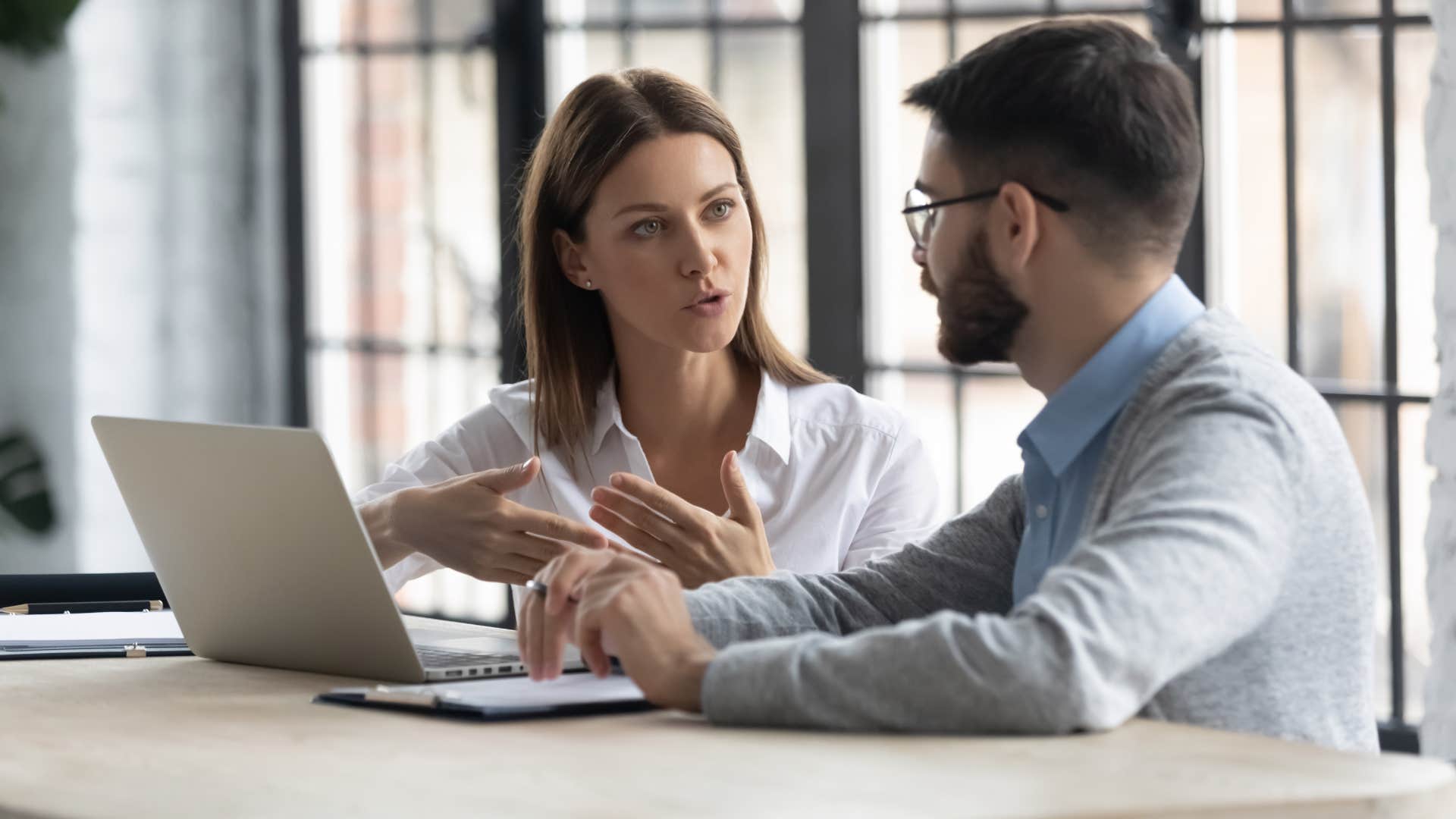manager asking employee why their communication is poor