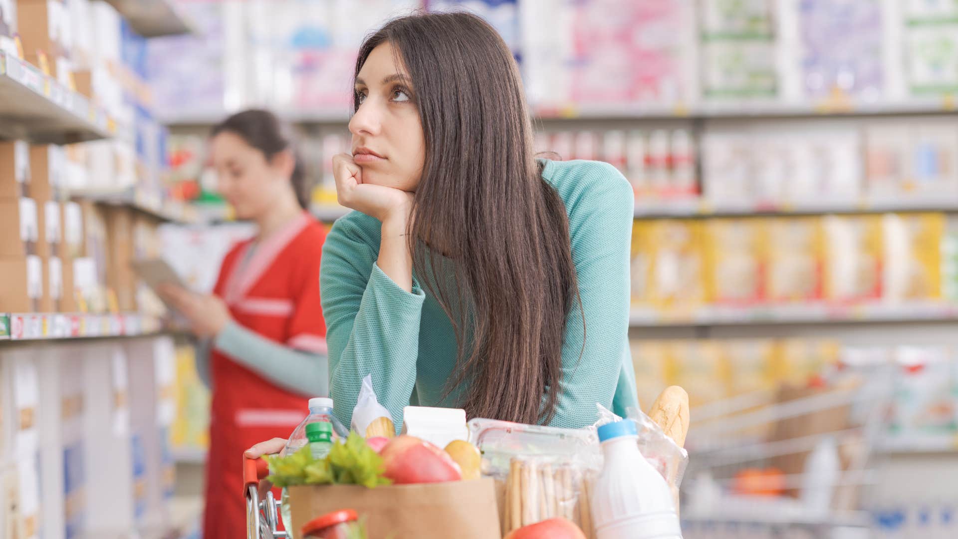 woman buying food in bulk