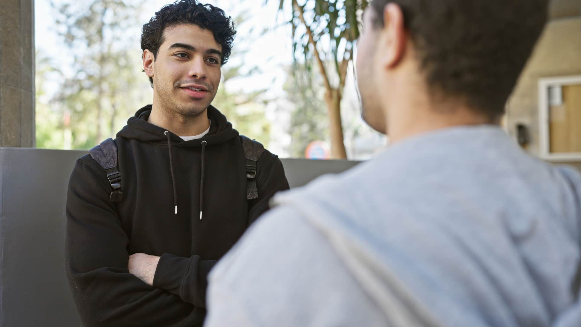 man getting others to listen by speaking boldly