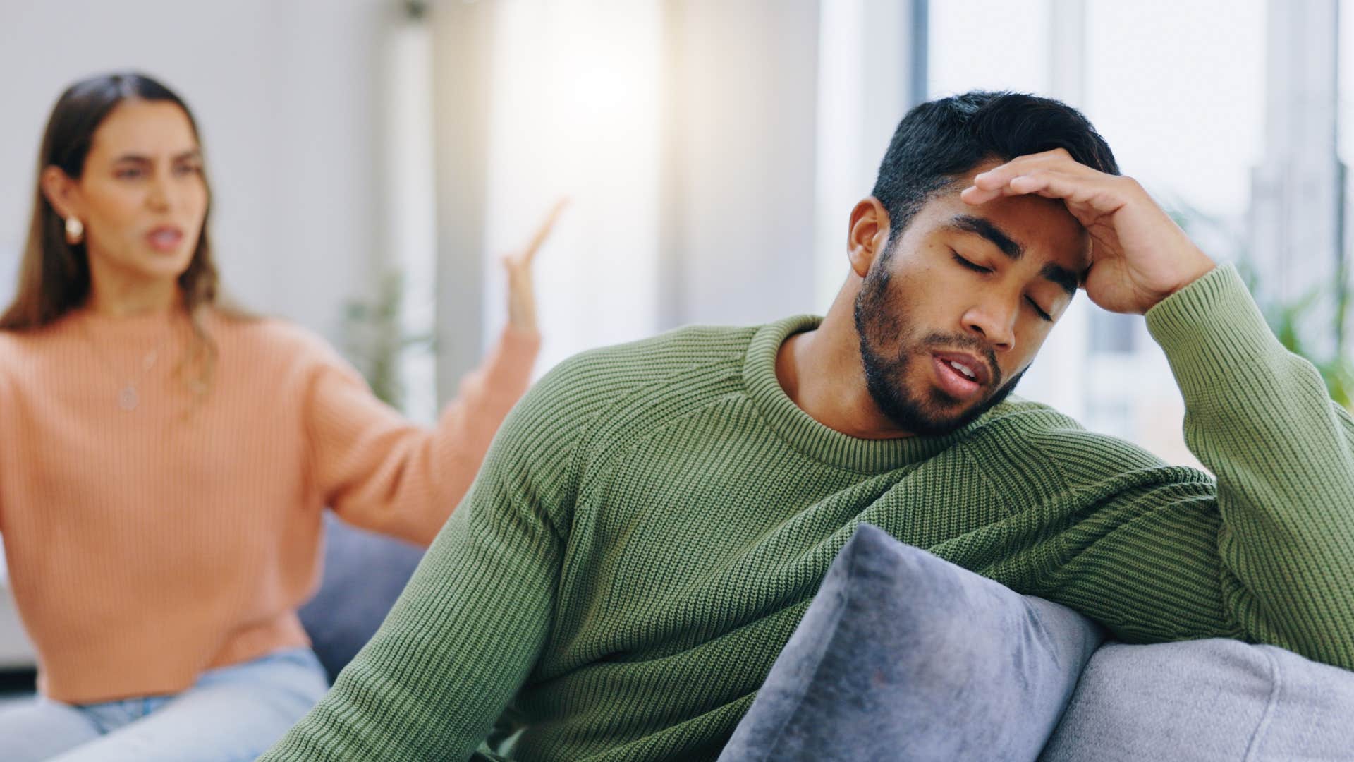 angry woman yelling at partner to spend time with her instead of his friends