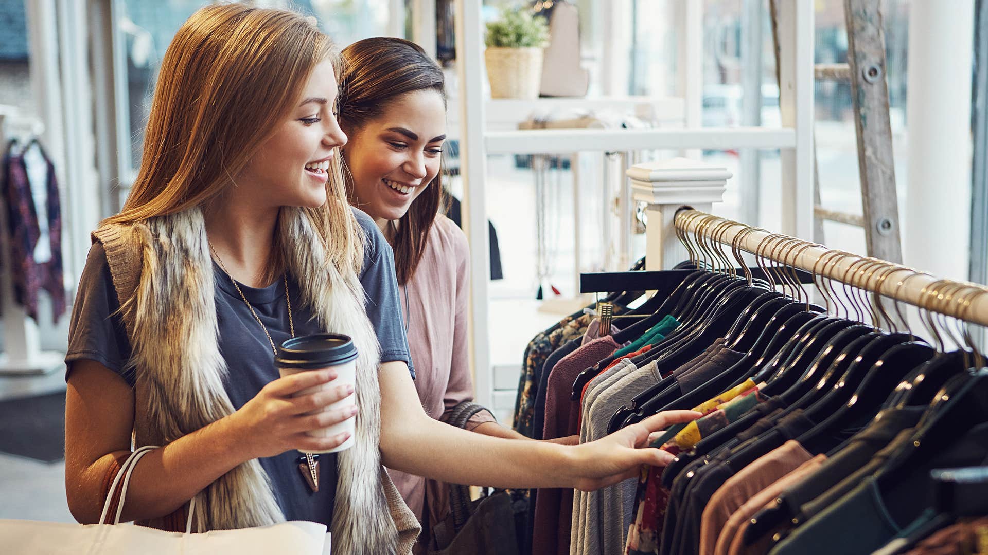 Two women shopping for new clothes for every event.