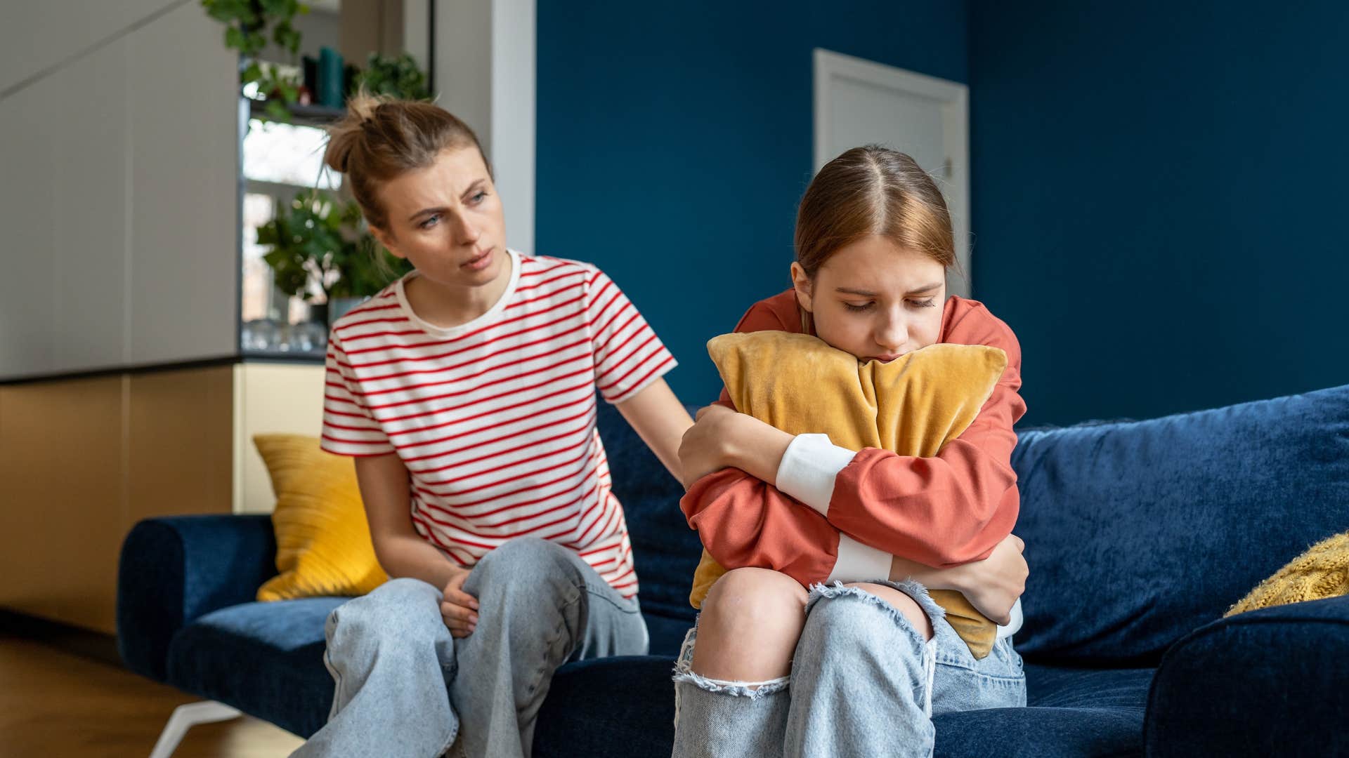 mom trying to comfort anxious kid