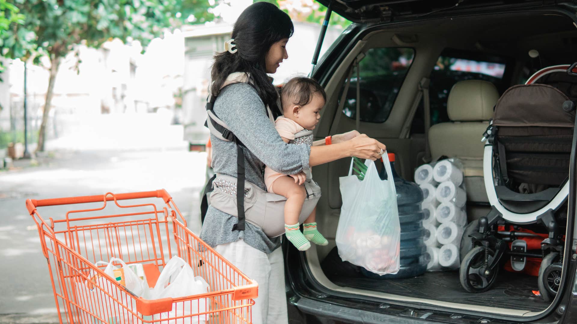 woman not putting her shopping cart back in the parking lot