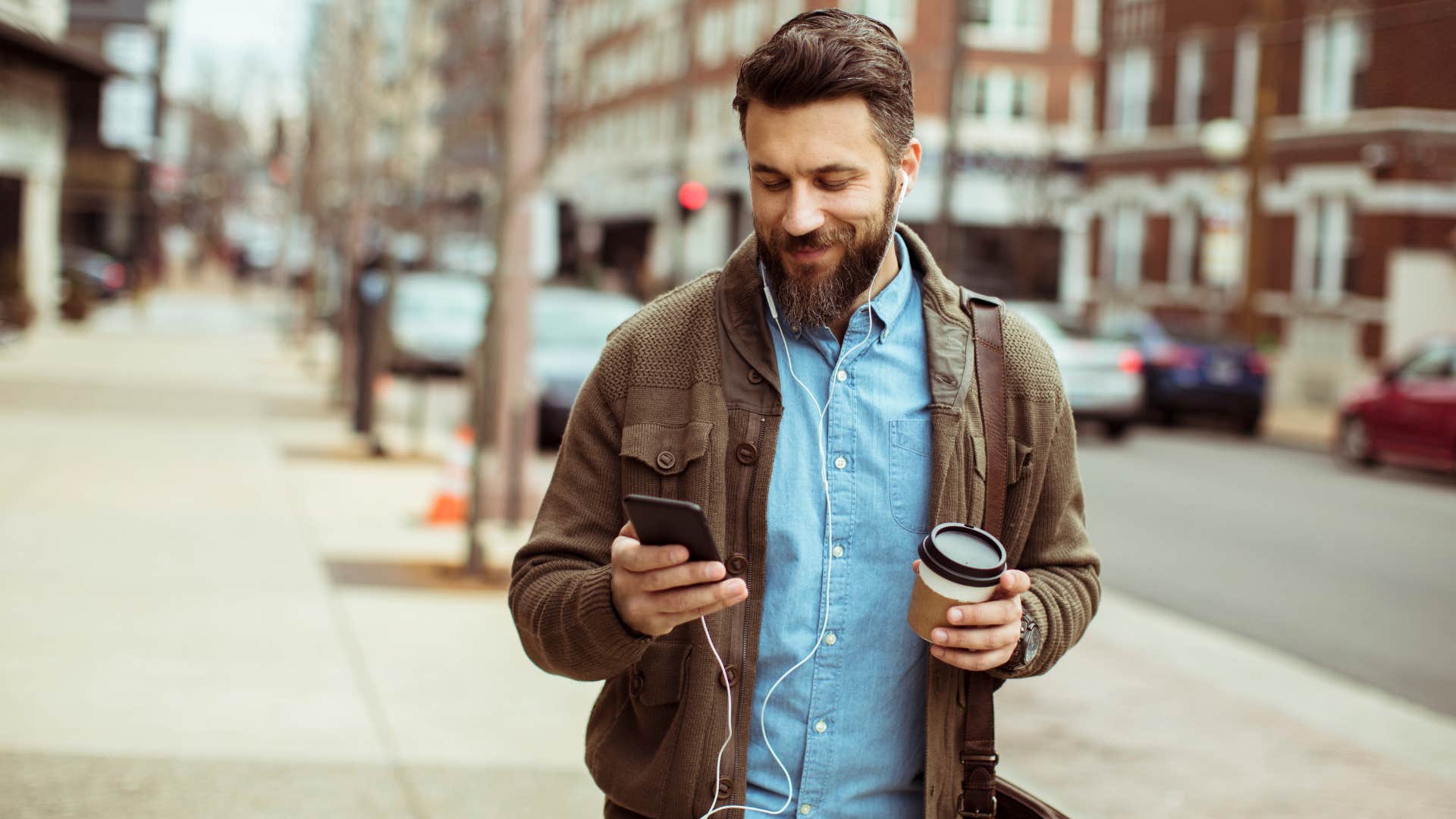 man stopping abruptly while walking on the street