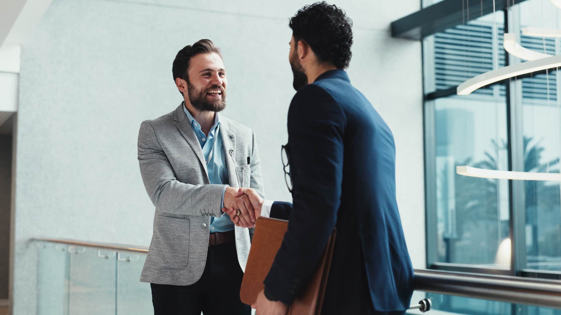 man with effortless social grace walking up to the person
