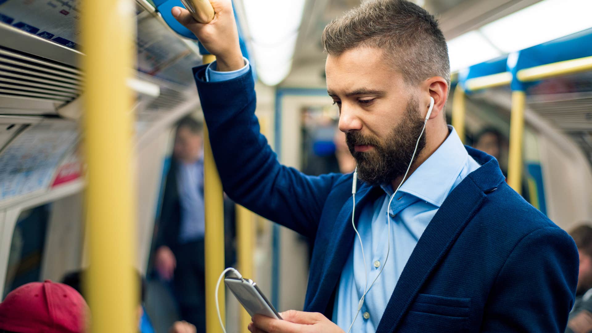 professional man riding public transportation