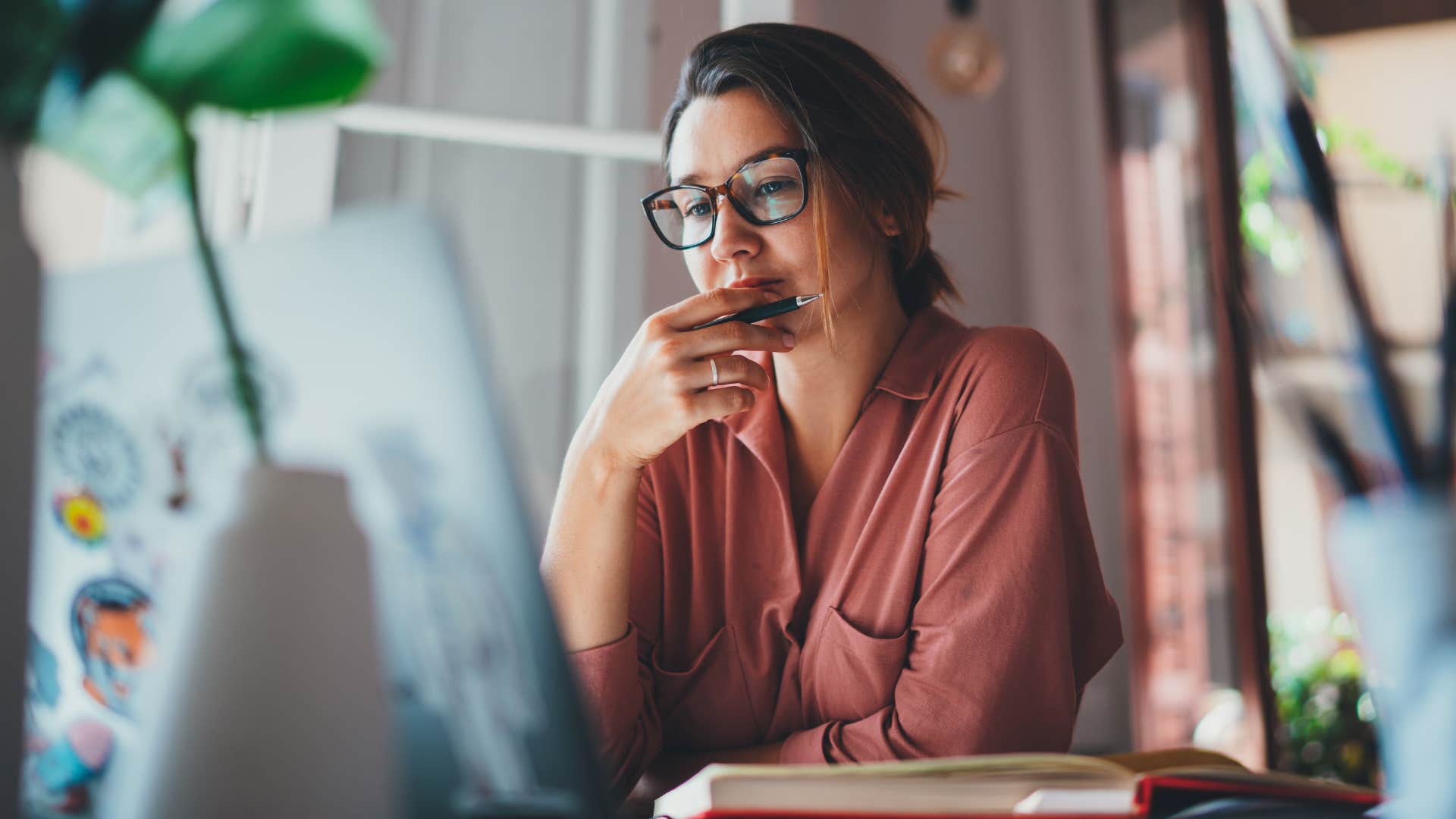 Woman following a creative passion on her laptop.