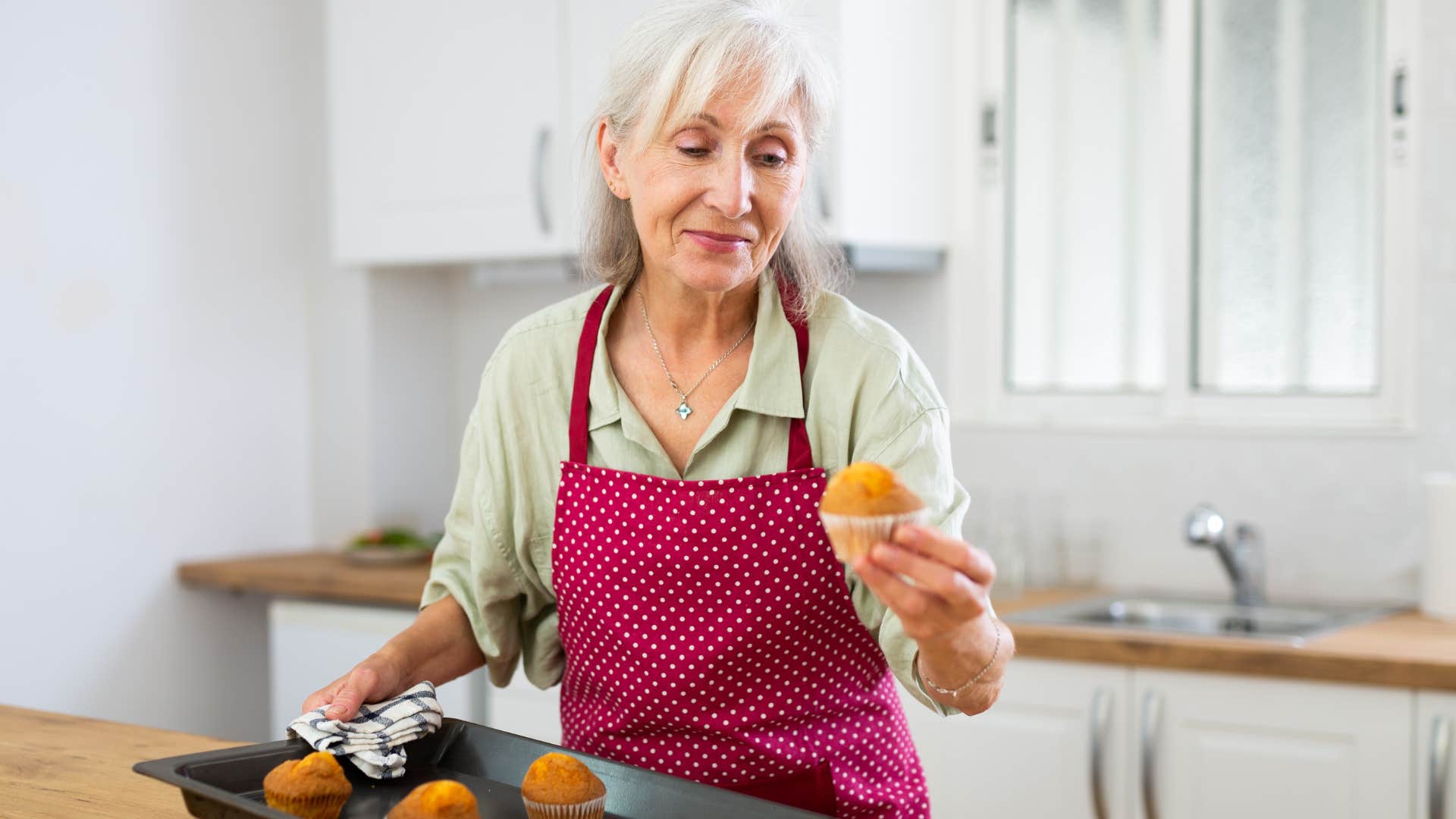 older frugal woman making baked goods